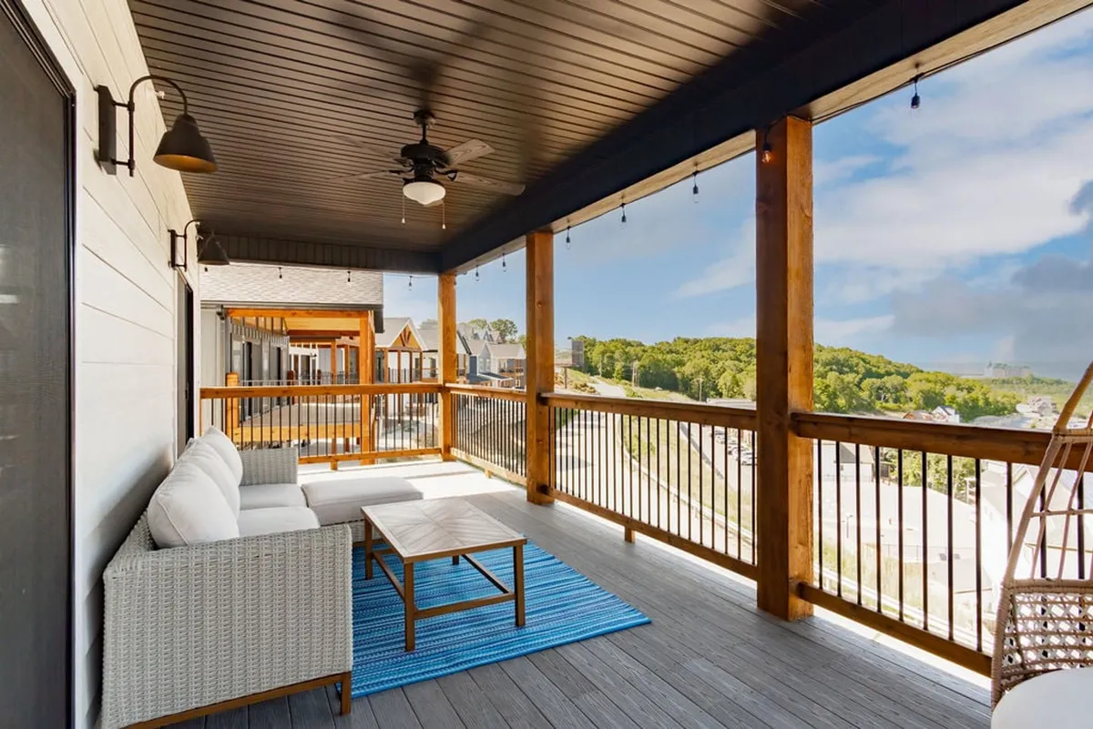 An inviting outdoor seating area with a stylish rug and comfortable chairs, set against a backdrop of scenic views. The arrangement suggests a perfect spot for relaxing after outdoor adventures, watching sunsets, or hosting a barbecue.